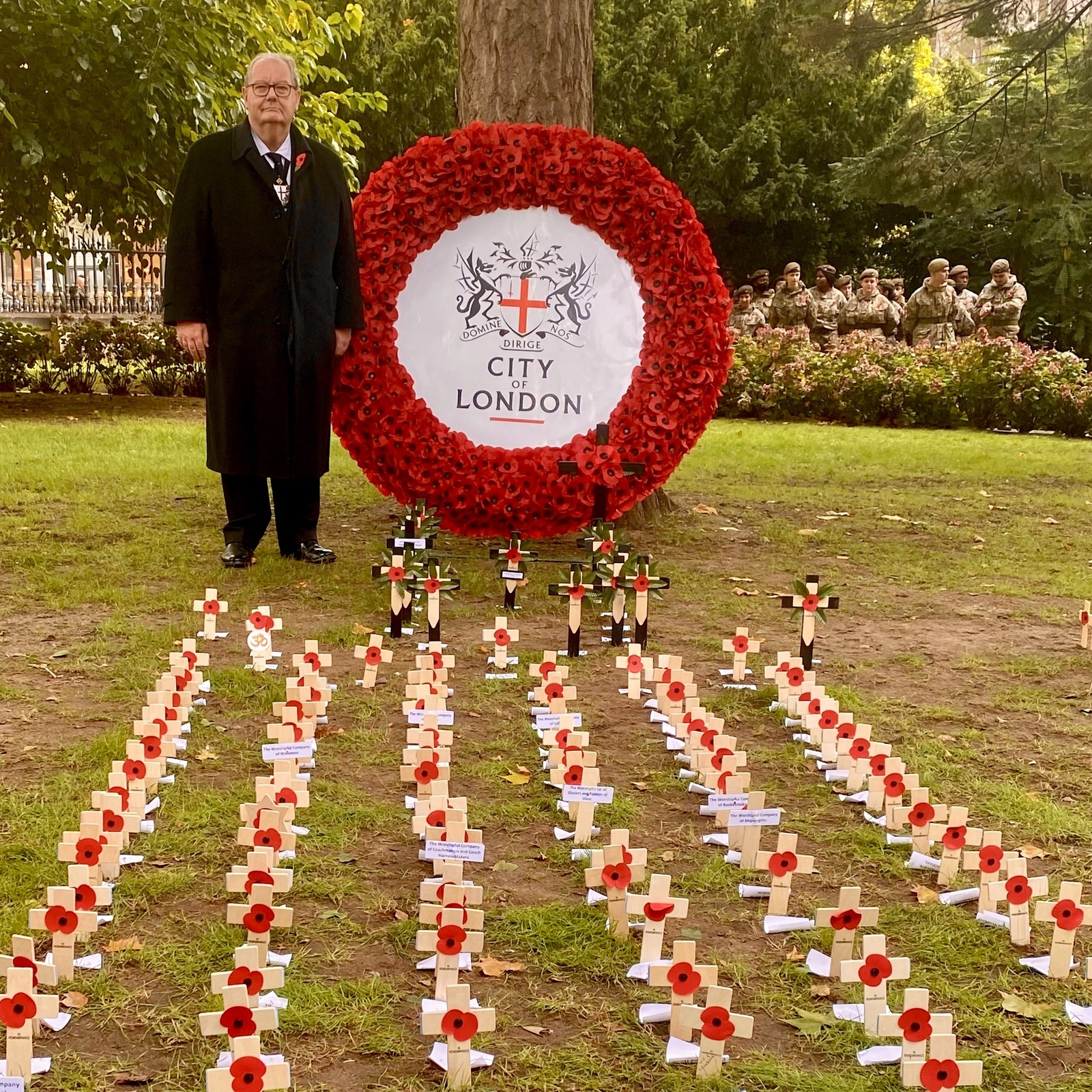 Placing a cross within the Garden of Remembrance at St Paul’s on behalf of the Marketors